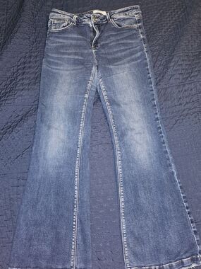 Risen Mid Rise Flare Jeans for Women